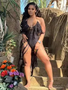 Black crochet one-piece swimsuit with long fringe details for women's beachwear.