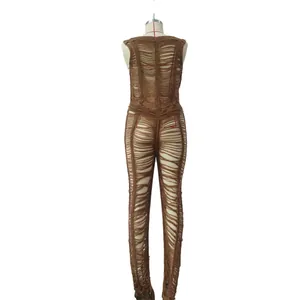 Detailed back view of a sexy brown knitted hollow-out distressed jumpsuit beachwear
