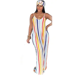 Detail view of a loose colorful striped cotton slip maxi dress with matching headband