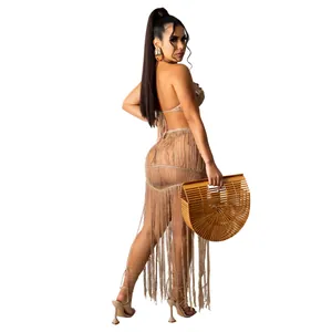 Sexy beige knit mesh two-piece set featuring fringe long beach skirt and strapless top