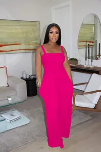 Elegant hot pink sleeveless wide-leg jumpsuit featuring a shirred bodice for women's fashion.
