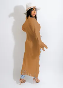 Detailed back view of a stylish long camel knit sweater with fringe hem and sleeves