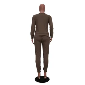 Detailed back view of women's urban casual autumn/winter two-piece tracksuit in brown