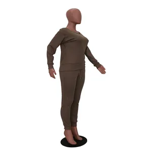 Side view of a brown urban casual two-piece sweatshirt and matching pants set on mannequin