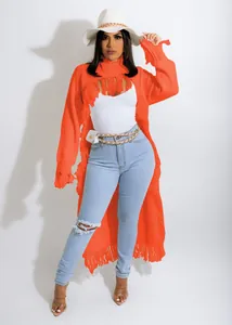 Trendy orange longline knit cardigan with bohemian tassel trim and distressed details for women
