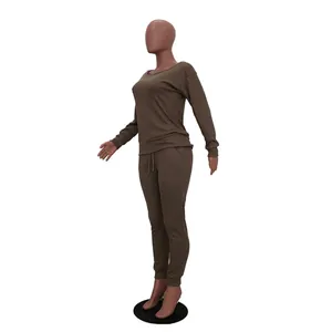 Side view of casual brown long sleeve two-piece tracksuit set displayed on a mannequin.