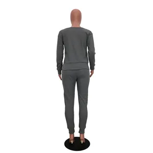Back view of a grey urban casual two-piece set for women's autumn winter fashion