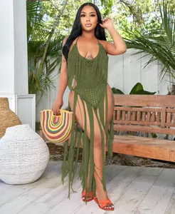 Chic olive green crochet knit beach cover-up featuring long fringe and cutout details.