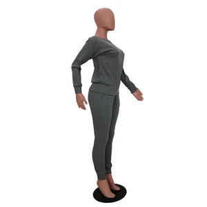 Side profile view of a dark gray women's two-piece casual tracksuit set on a mannequin