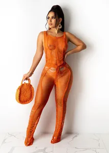 Sexy orange knit hollow-out beach jumpsuit for women, sleeveless summer vacation wear