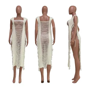 Detailed views of a white distressed tassel beach cover-up dress with side ties
