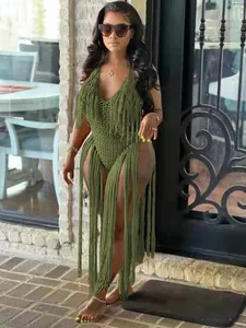 Detailed view of an olive green crochet monokini featuring long floor-length fringes