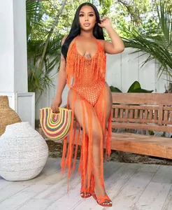 Stunning orange crochet one-piece swimsuit with long dramatic floor-length fringe