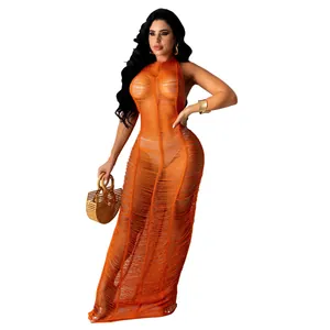 Sexy orange knitted sleeveless beach maxi dress for women with sheer ribbed texture.