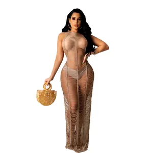 Full length view of sexy sheer knitted beach maxi dress for women on white background