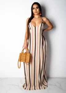 Full body model showcase of a colorful vertical striped cotton camisole maxi dress