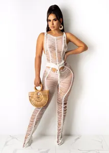 Sexy white knitted hollow-out sleeveless jumpsuit ideal for beach, resort and club wear