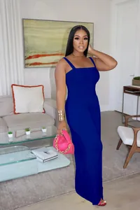 Detailed view of the royal blue pleated wide-leg jumpsuit featuring a square neckline