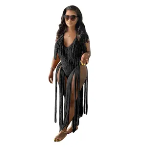 Detailed view of sexy black crochet monokini featuring long bohemian fringe tassels