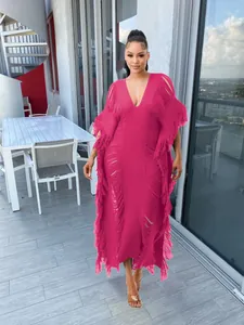 Handmade fuchsia crochet knit maxi dress with elegant tassel fringe and deep V-neckline
