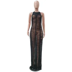 Detail view of sexy black knit beach maxi dress with a distressed shredded effect on mannequin