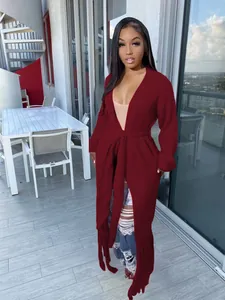 Elegant wine red long knit cardigan sweater featuring stylish tassel hem and waist tie for women.