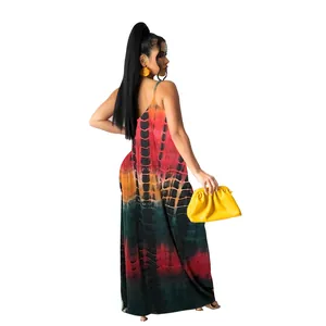 Detailed back view of a vibrant tie-dye cotton maxi camisole dress with yellow clutch