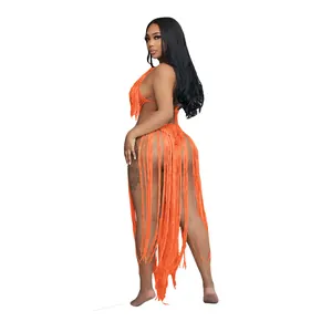 Detail shot of orange crochet knit texture on a sexy fringed one-piece swimsuit