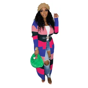 Full view of a casual color-block handmade knit long cardigan jacket on a model