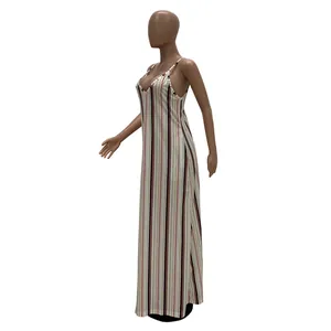 Side profile of a striped cotton maxi dress with spaghetti straps on a mannequin