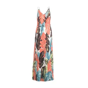 Detail view of tropical leaf print on a casual cotton v-neck spaghetti strap maxi dress