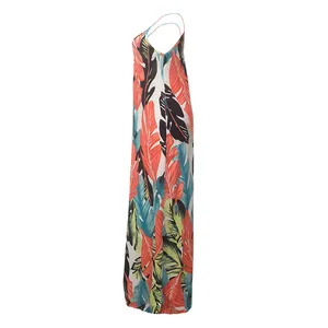 Side view of a casual loose cotton maxi dress featuring a vibrant tropical leaf print.