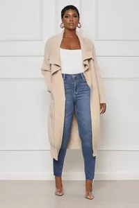 Full view of a long beige ribbed knit open cardigan with a elegant shawl collar