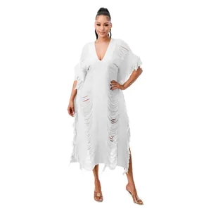 White handmade knitted tassel maxi dress with distressed see-through design detail