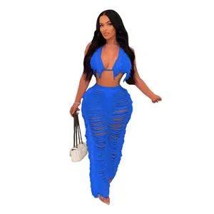 Haut de bikini en tricot bleu à franges et pantalon de plage ajouré assorti