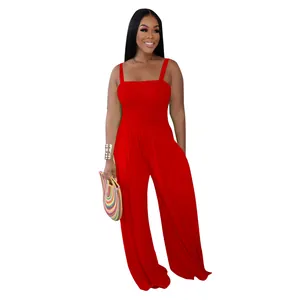 Fashionable red smocked bodice wide-leg jumpsuit with thin straps for casual summer wear
