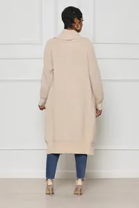 Back view of a chic women's casual solid beige long-line open-front knitted cardigan