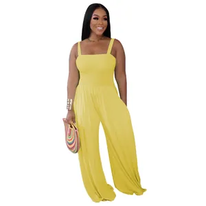 Full-length view of a yellow sleeveless wide-leg jumpsuit with a smocked bodice