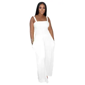Elegant white smocked wide-leg jumpsuit with spaghetti straps for stylish women