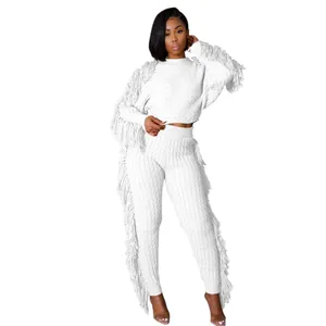 Chic white fringe knitted two-piece set featuring long sleeve sweater and leggings