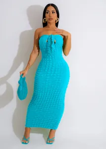 Detailed close-up showing the unique texture of this turquoise bubble fabric strapless dress