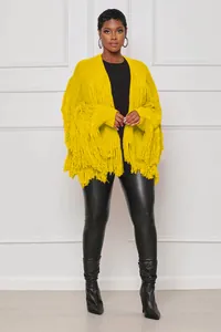 Chic bright yellow knitted fringe cardigan jacket for women in stylish urban outfit set