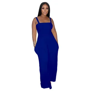 Detail of a solid blue smocked tube top wide-leg jumpsuit with straps.