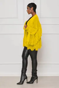 Close-up side view of a bright yellow knitted cardigan featuring tiered fringe details.