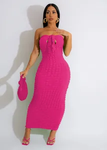 Sexy hot pink bubble textured fabric strapless bodycon midi dress with chest knot detail