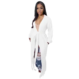 Elegant women's long knitted cardigan in white featuring stylish tassel fringe details