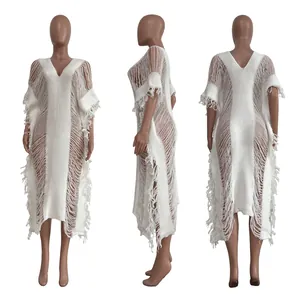 Triple view of a white handmade knitted see-through dress with tassel details