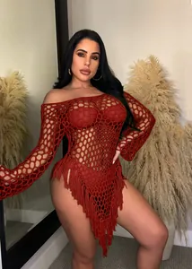 Sexy red hollow-out crochet beach dress with fringe tassels and wide mesh detail for summer.