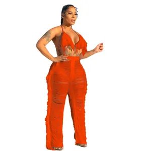 Élégant ensemble bikini en tricot orange à deux pièces avec franges pour la plage.
