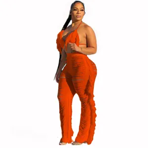 Ensemble de plage 2 pièces orange avec bikini à franges et pantalon pour les vacances